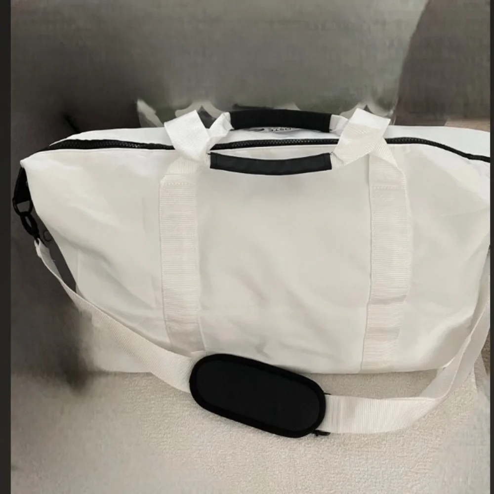 Lacoste perfumes- White Nylon Duffel Bag with Black Accents